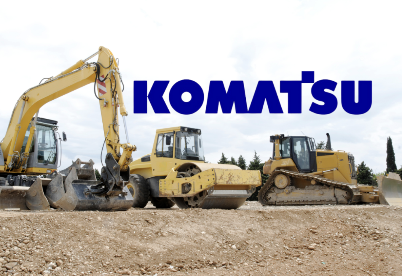 Three yellow Komatsu construction vehicles (excavator, road roller, and bulldozer) on a dirt construction site